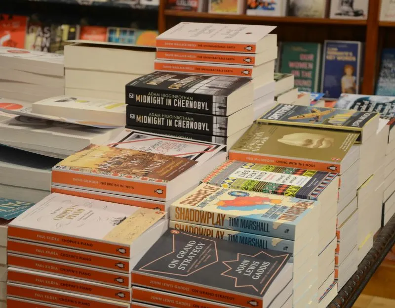 fiction books placed on a shelf