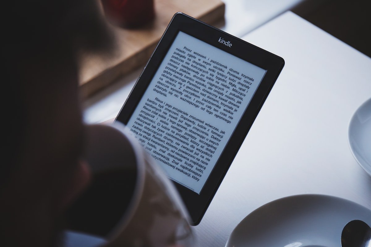 Amazon Kindle e-reader showing an open book on screen