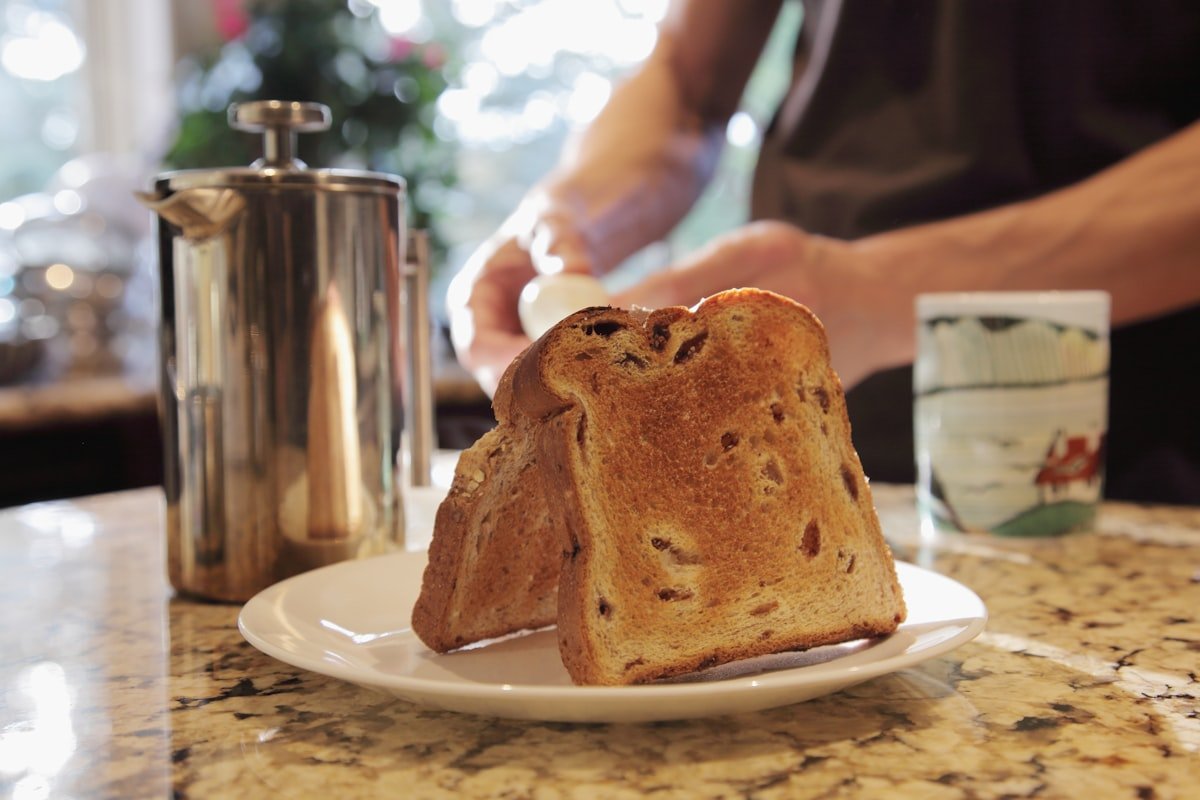 Fresh toast and coffee on a kitchen counter