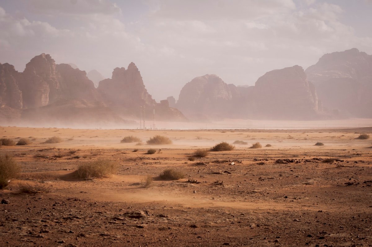 Best Dark Fantasy Books to Read in 2026: Grimdark to Gothic 7 Vast dusty desert valley, evoking an epic sprawling fantasy battlefield