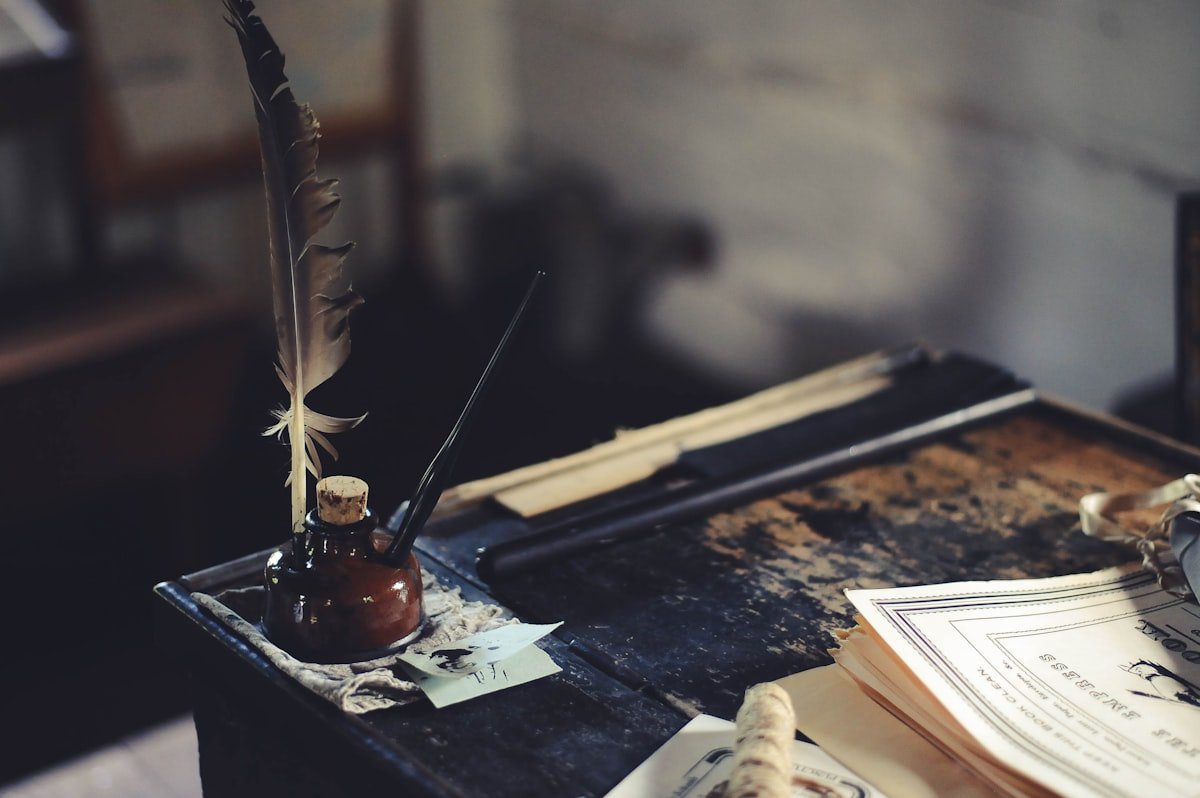 An ink bottle on a writing desk