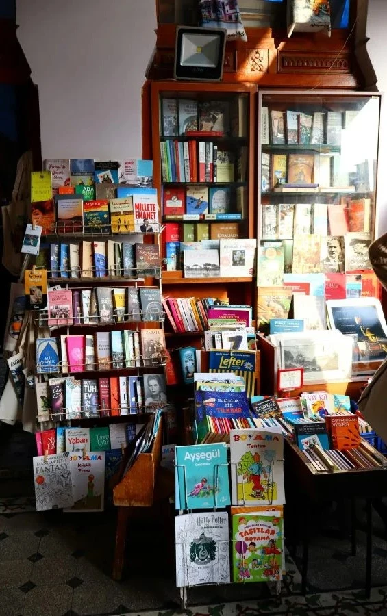 Religion and Sprituality 16 Bookstore display with a wide selection of religion, spirituality, and inspirational books on shelves and book racks.