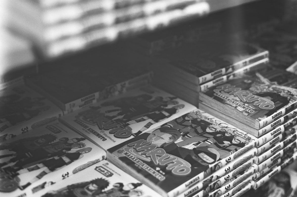 Stacks of manga books arranged on a shelf